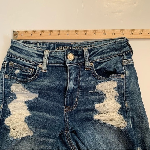 AEO Next Level Stretch Hi-rise Shortie Distressed Fray Denim Shorts - Picture 12 of 13